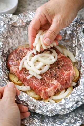 Layer onions and these 2 ingredients with steak for a baked meal I won’t get tired of