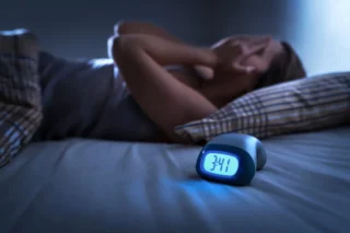 Why You Keep Waking Up at the Same Time Every Night—and What It Could Mean